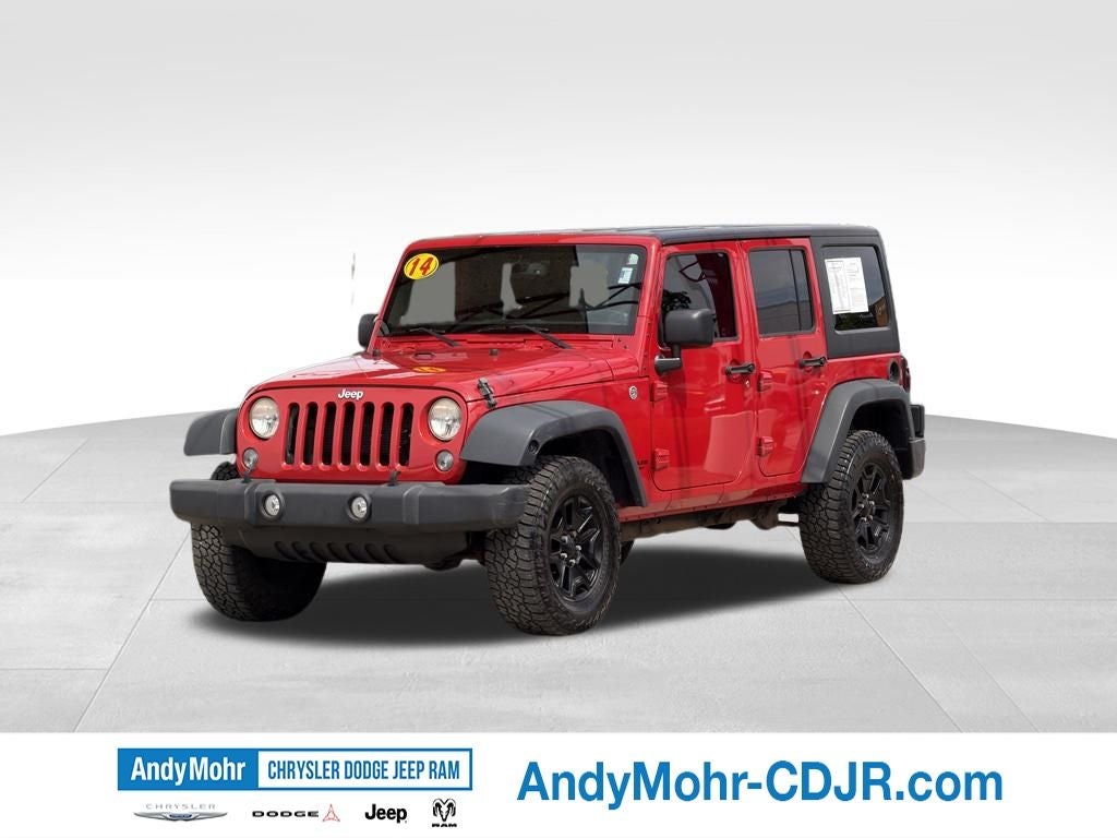 2014 Jeep Wrangler — rear three-quarter view