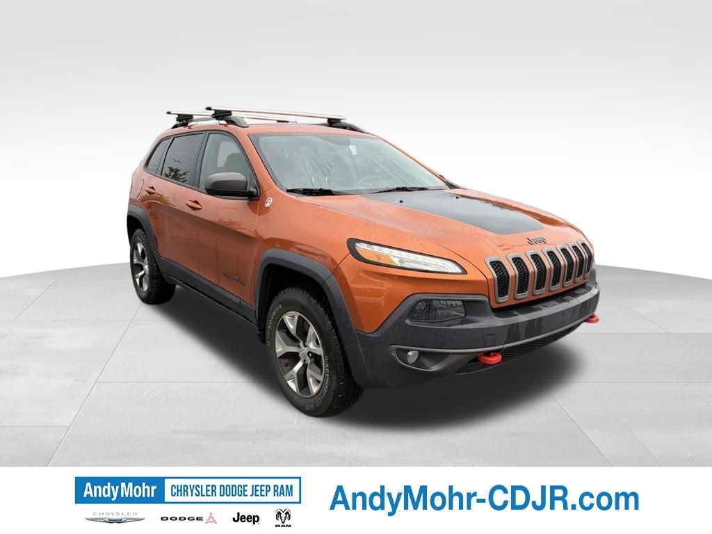 2015 Jeep Cherokee Trailhawk in Mango Tango Pearlcoat — front three-quarter view