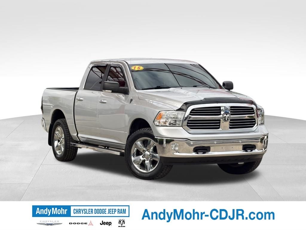 2015 RAM 1500 Big Horn in Bright Silver Clearcoat Metallic — front three-quarter view