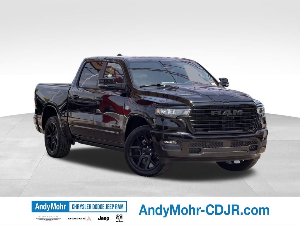 2026 RAM Ram 1500 Laramie in Diamond Black Crystal Pearl-Coat Exterior Paint — front three-quarter view