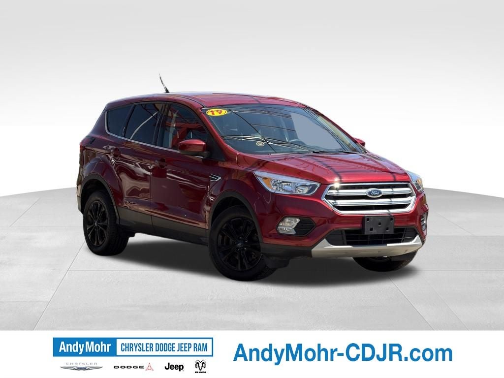 2019 Ford Escape SE in Ruby Red Metallic Tinted Clearcoat — front three-quarter view