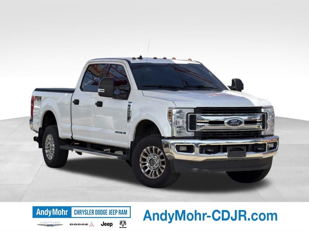 2019 Ford F-250 XLT in Oxford White — front three-quarter view