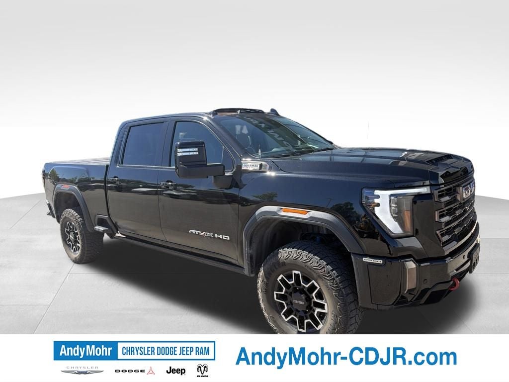 2024 GMC Sierra 2500HD AT4X in Onyx Black — front three-quarter view