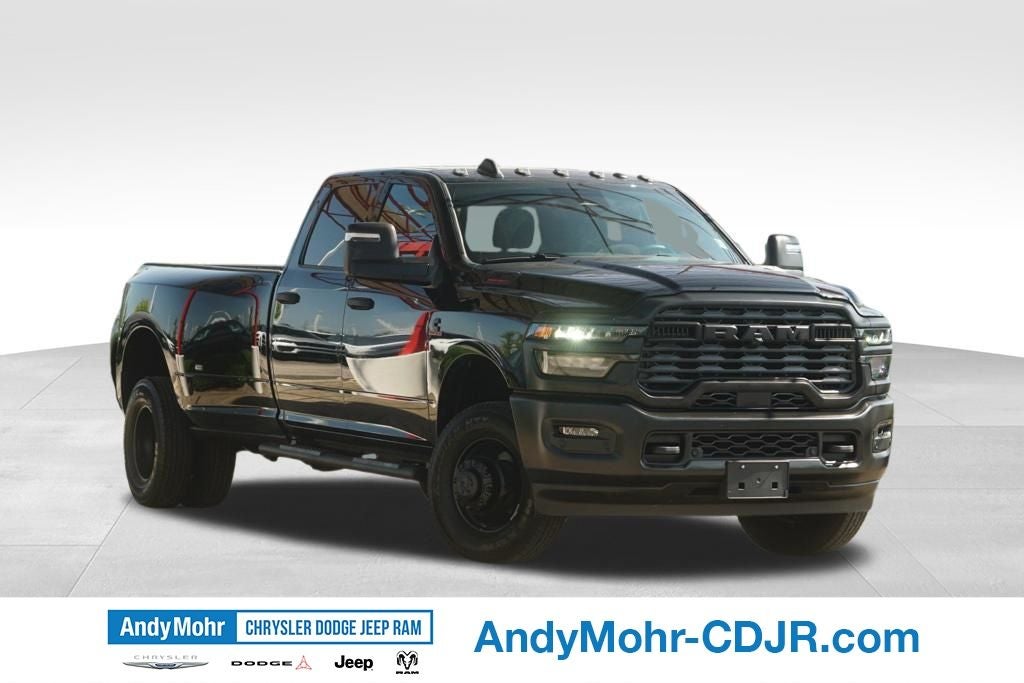 2026 RAM Ram 3500 Tradesman in Diamond Black Crystal Pearl-Coat Exterior Paint — front three-quarter view
