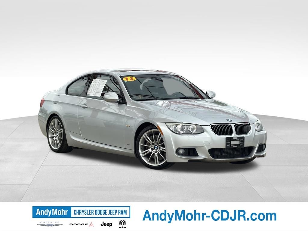 2012 BMW 335i 335i in Titanium Silver Metallic — front three-quarter view